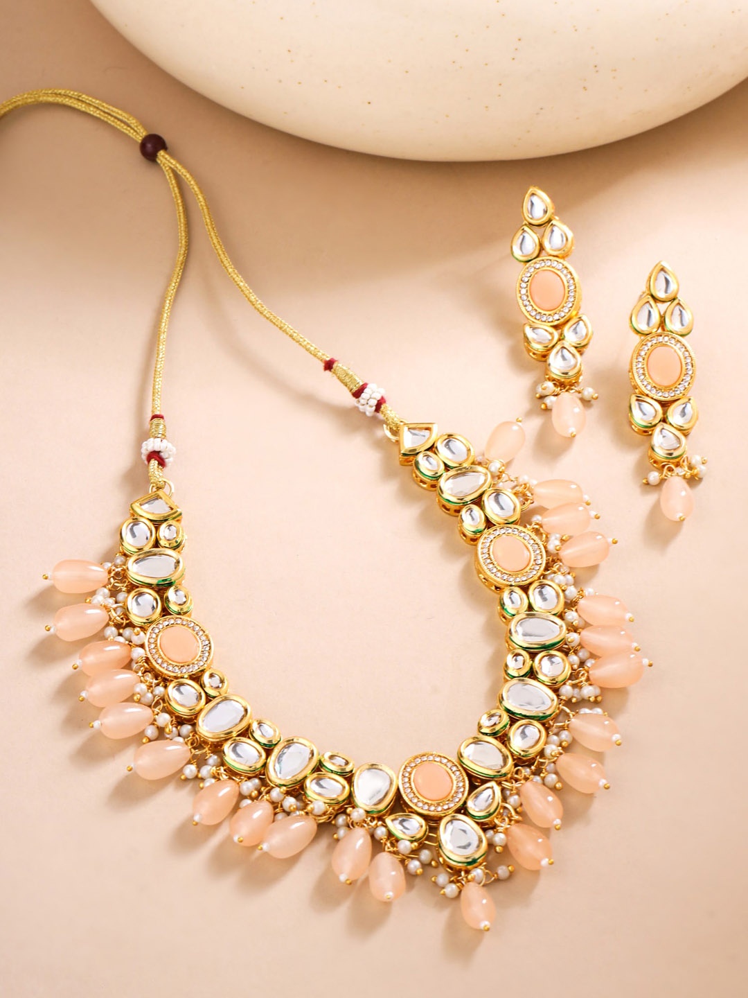 

Yellow Chimes Gold-Plated Kundan Studded Necklace & Earrings