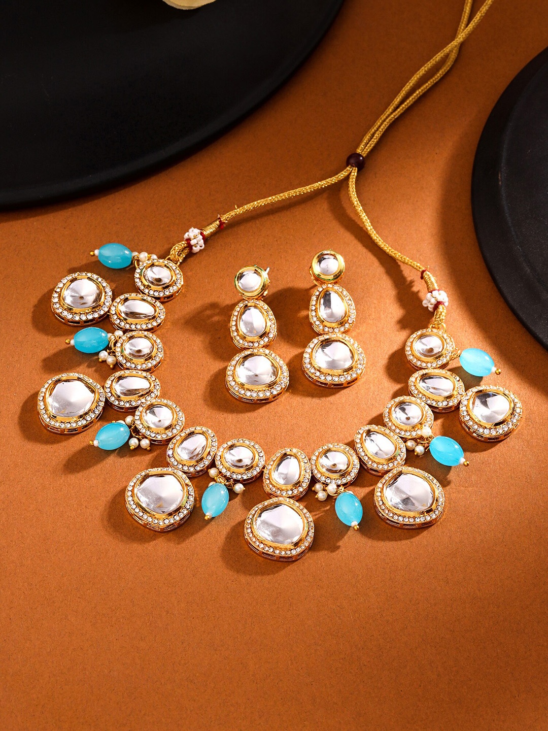 

Yellow Chimes Gold-Plated Stone Studded Necklace & Earrings