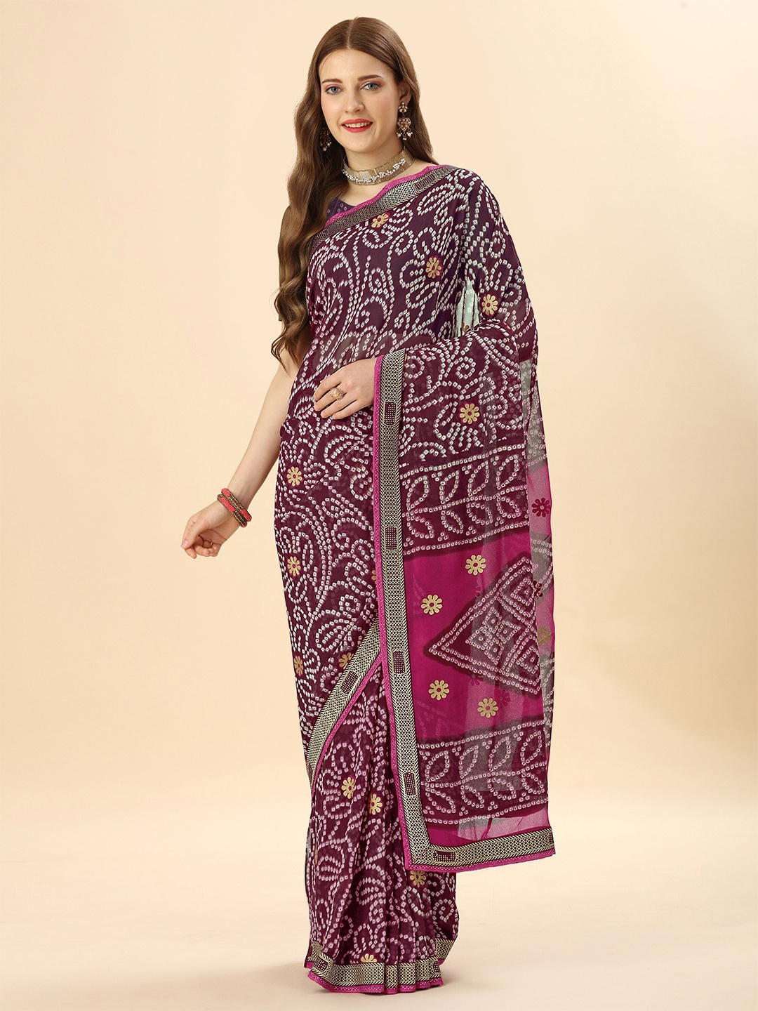 

Mitera Magenta & Purple Bandhani Printed Pure Georgette Saree