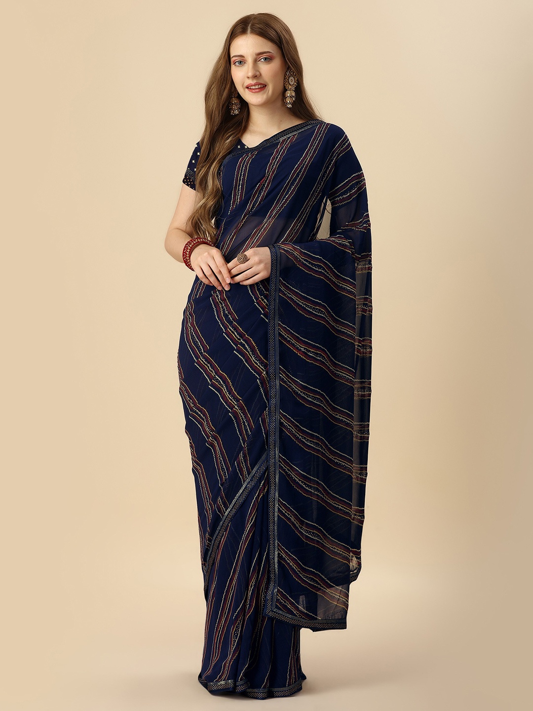 

Mitera Navy Blue & Purple Striped Beads & Stone Work Pure Georgette Saree