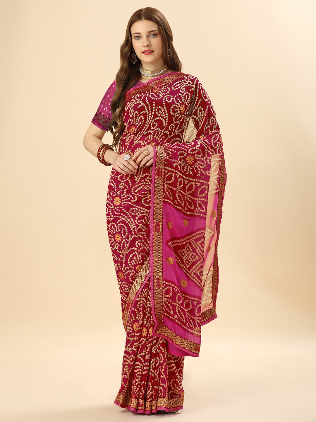 

Mitera Pink & Yellow Bandhani Beads and Stones Pure Georgette Saree