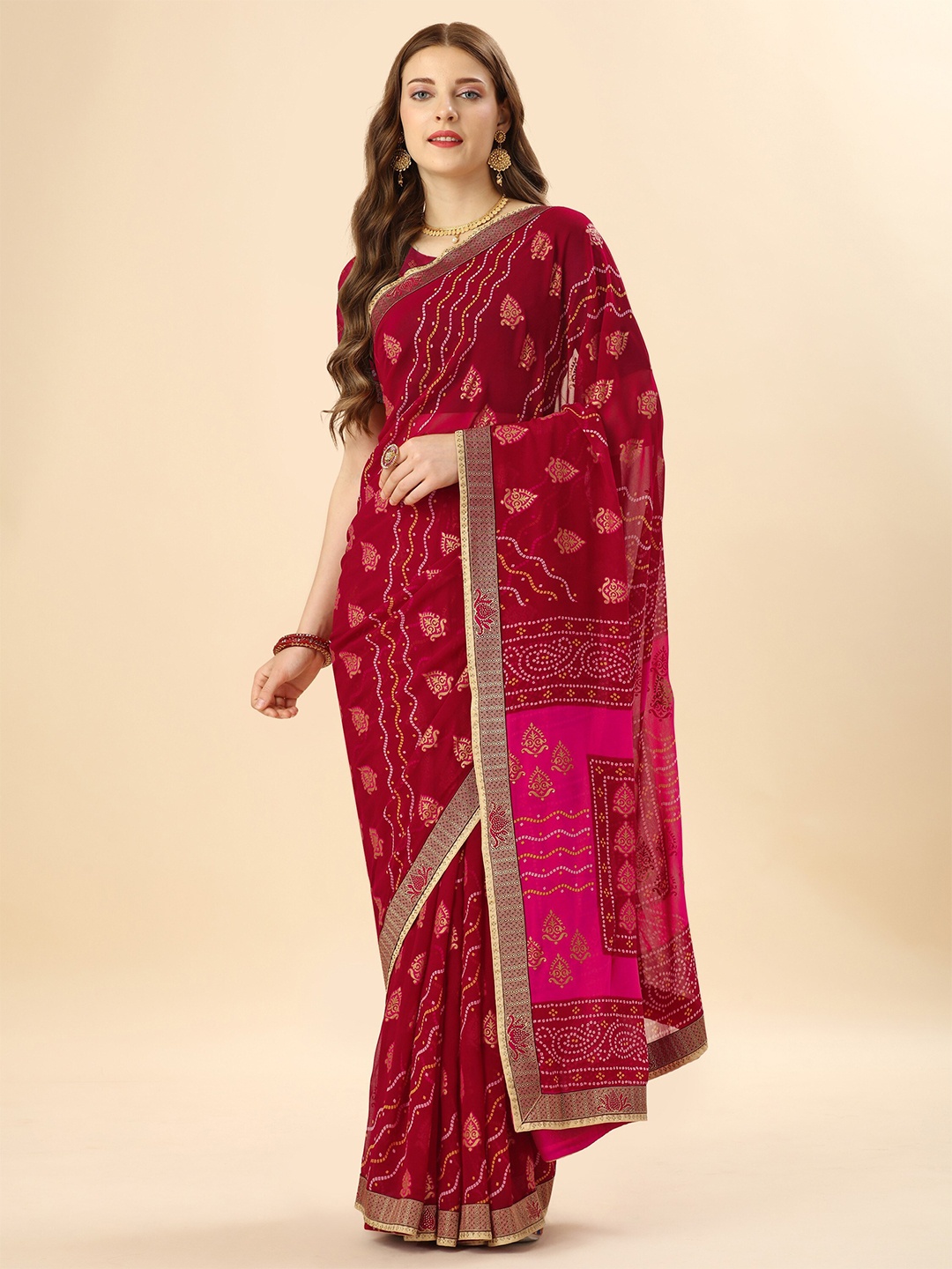 

Mitera Red & Yellow Ethnic Motifs Printed Beads and Stones Pure Georgette Saree