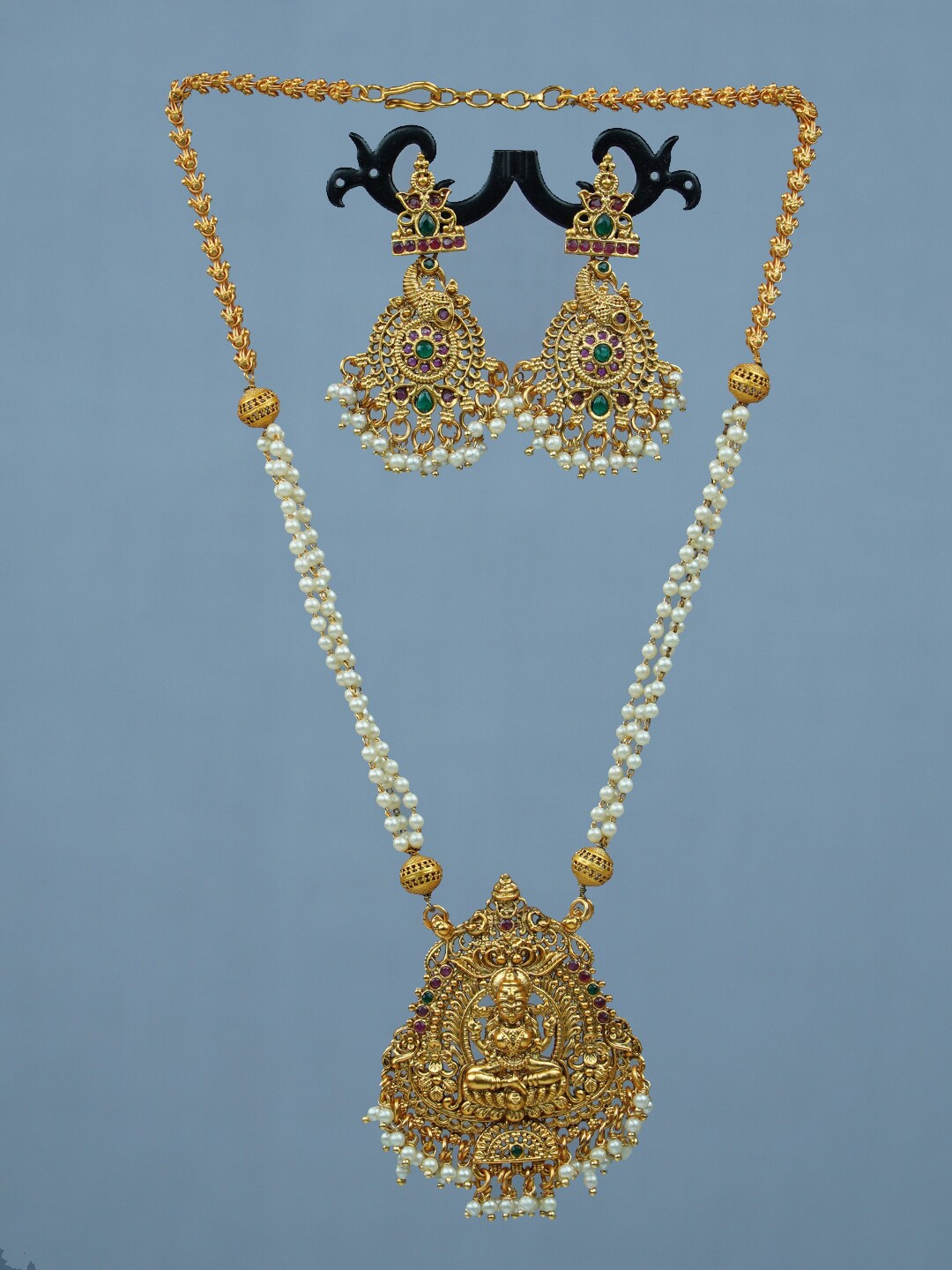 

Diksha collection Gold-Plated Stone Studded & Beaded Temple Jewellery Set