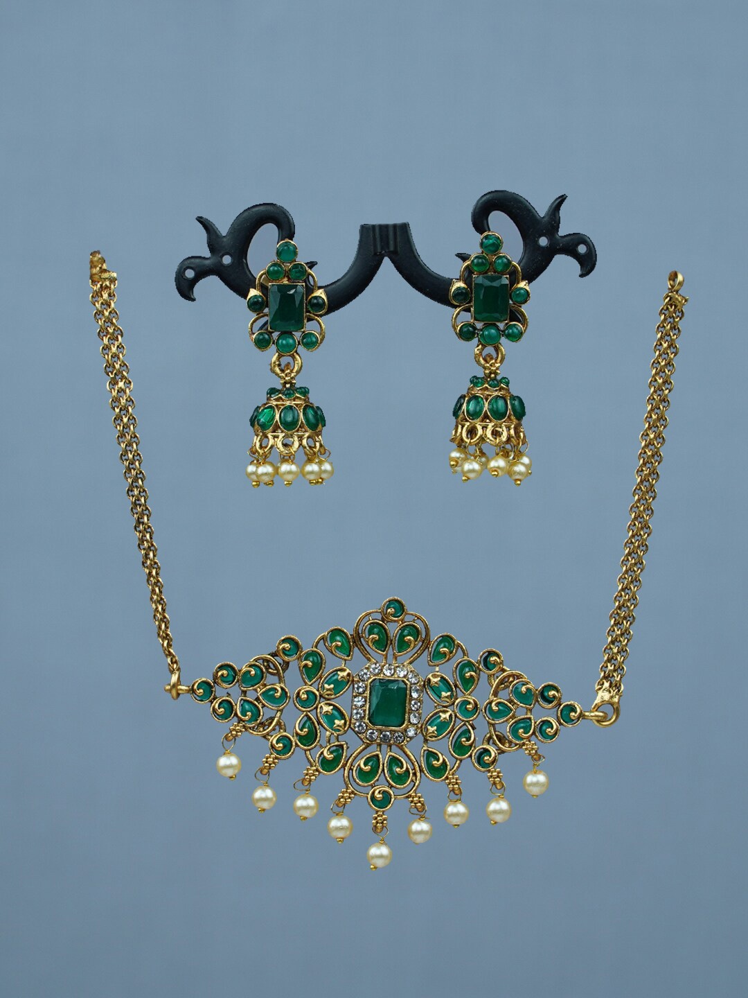 

Diksha collection Gold-Plated Stone Studded & Beaded Necklace & Earrings