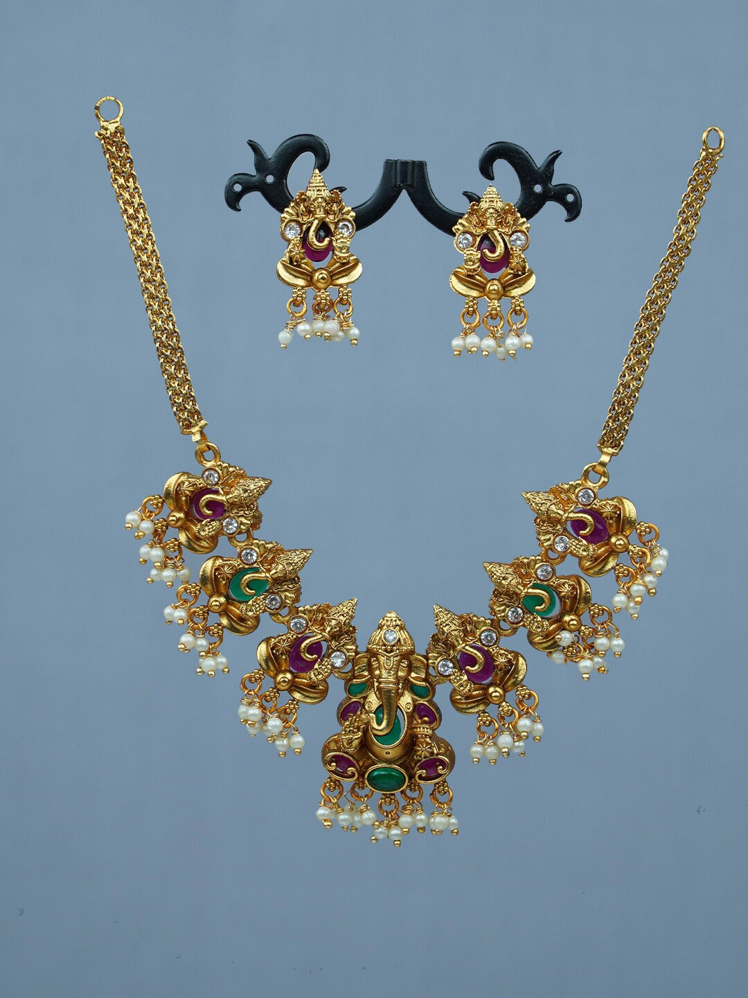 

Diksha collection Gold-Plated Stones-Studded & Beads-Beaded Jewellery Set