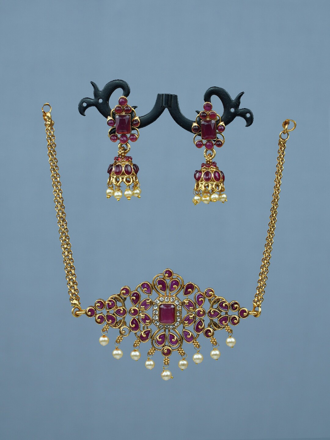 

Diksha collection Gold-Plated Stone Studded & Beaded Necklace & Earrings