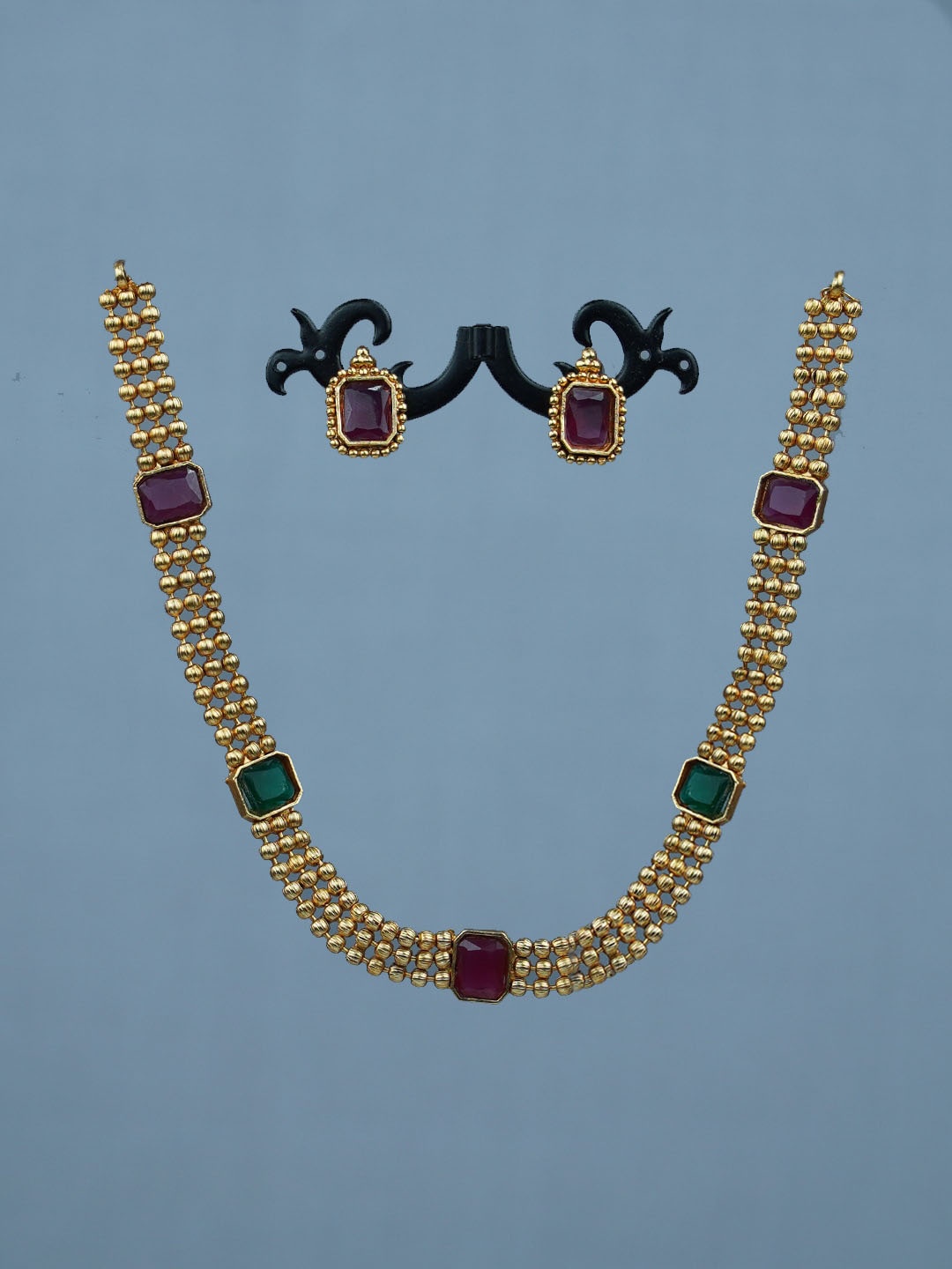 

Diksha collection Gold-Plated Stone Studded Necklace & Earrings