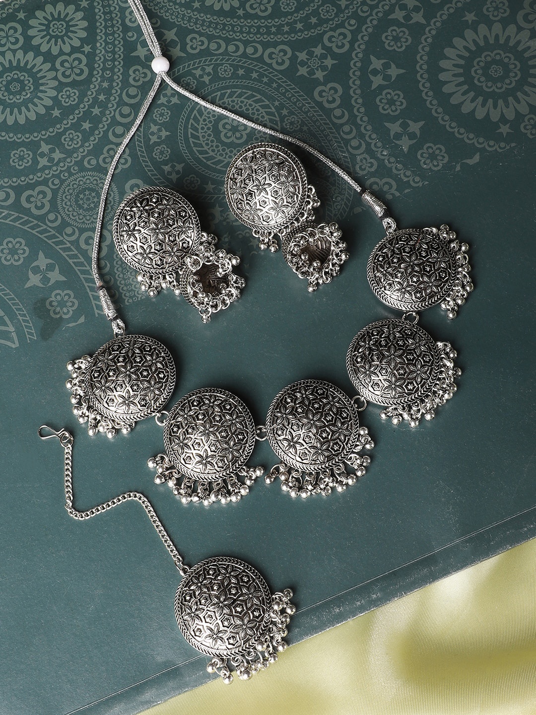 

ANIKAS CREATION Silver-Plated Intricate Textured Oxidised Jewellery Set