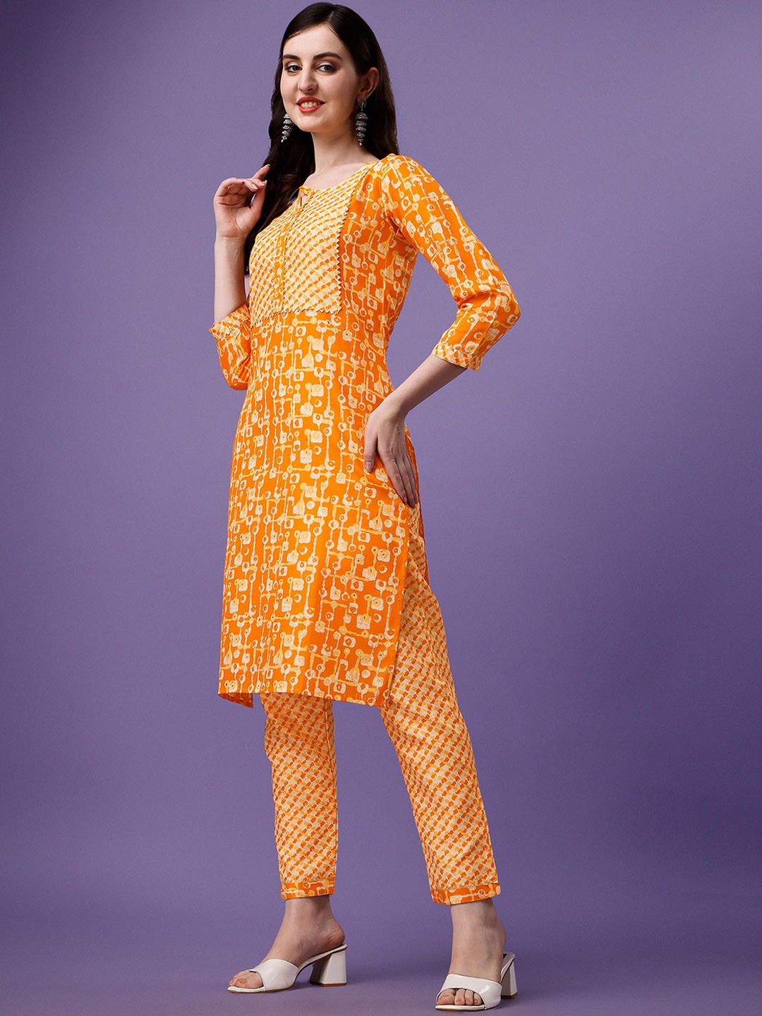 

Vaidehi Fashion Geometric Printed Gotta Patti Kurti With Trousers, Orange