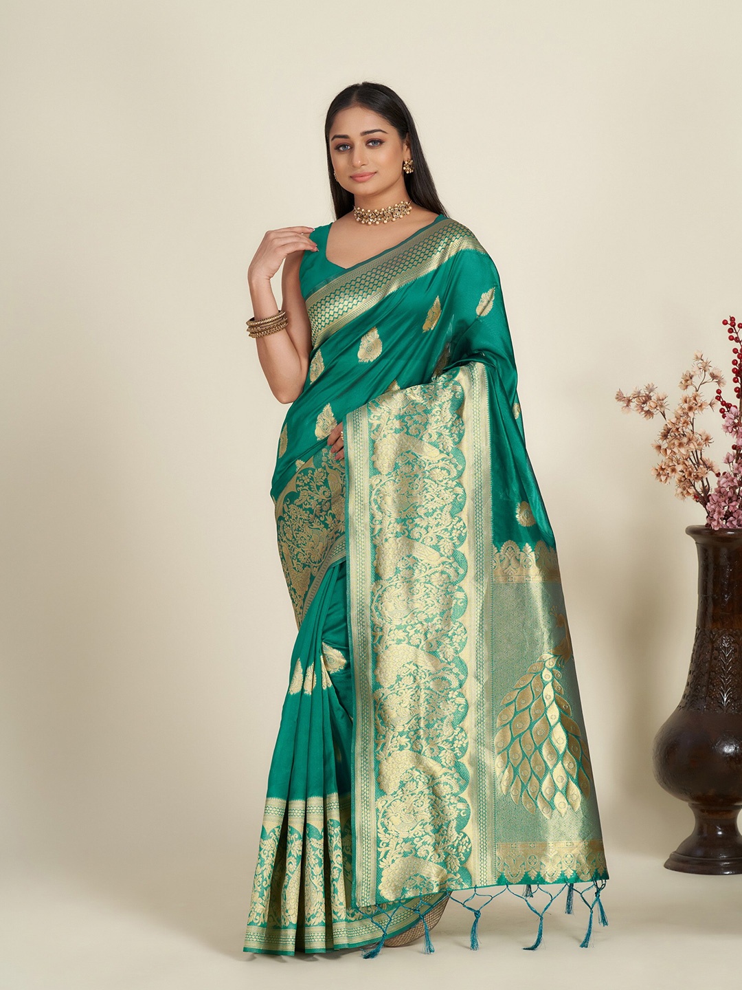 

Anouk Teal & Gold-Toned Ethnic Motif Woven Design Zari Organza Saree