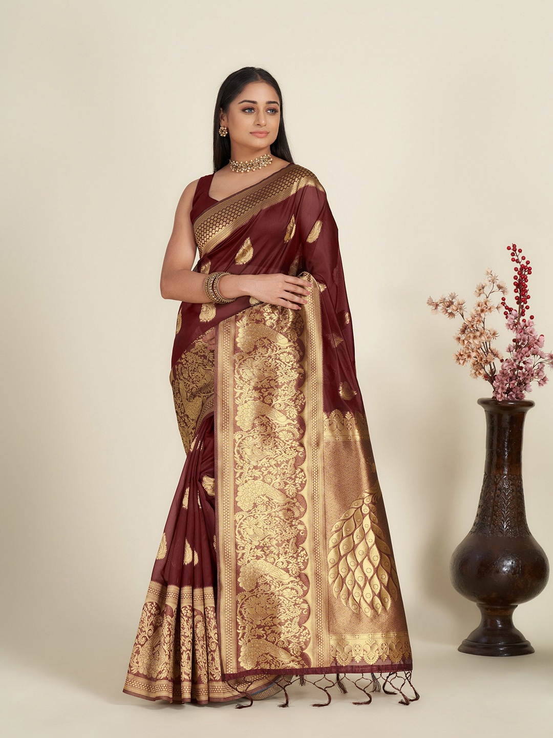 

Anouk Maroon & Gold-Toned Ethnic Motif Woven Design Zari Organza Saree