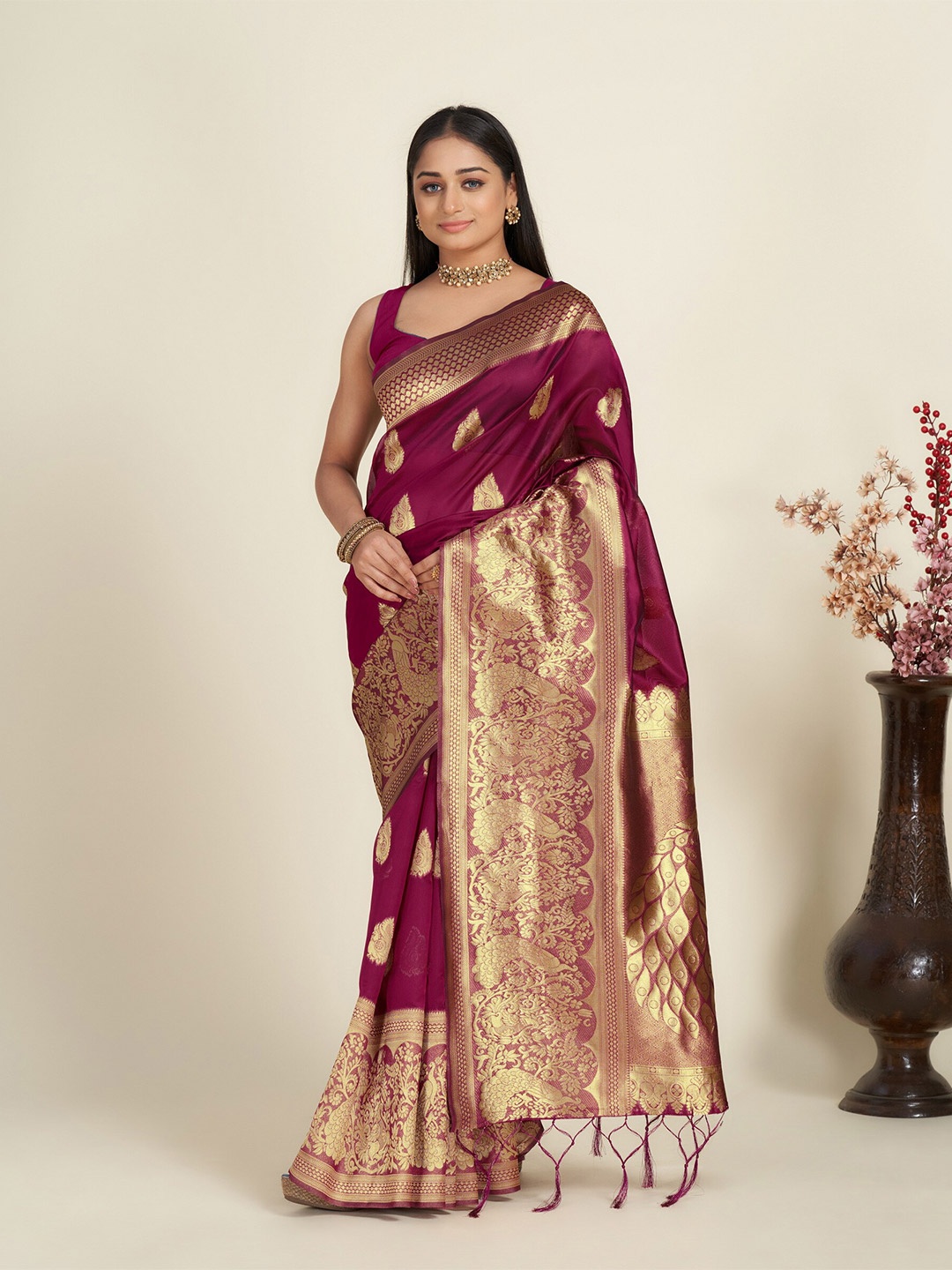 

Anouk Magenta & Gold-Toned Ethnic Motif Woven Design Zari Organza Saree