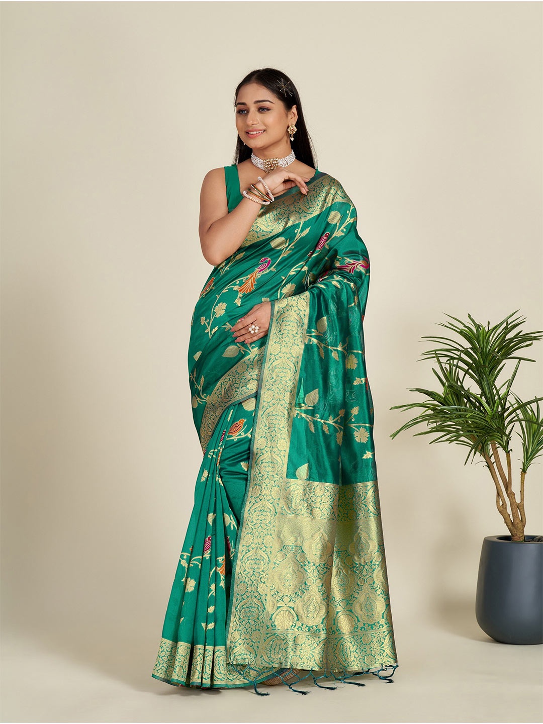 

Anouk Teal & Gold-Toned Floral Motif Woven Design Zari Organza Saree, Green