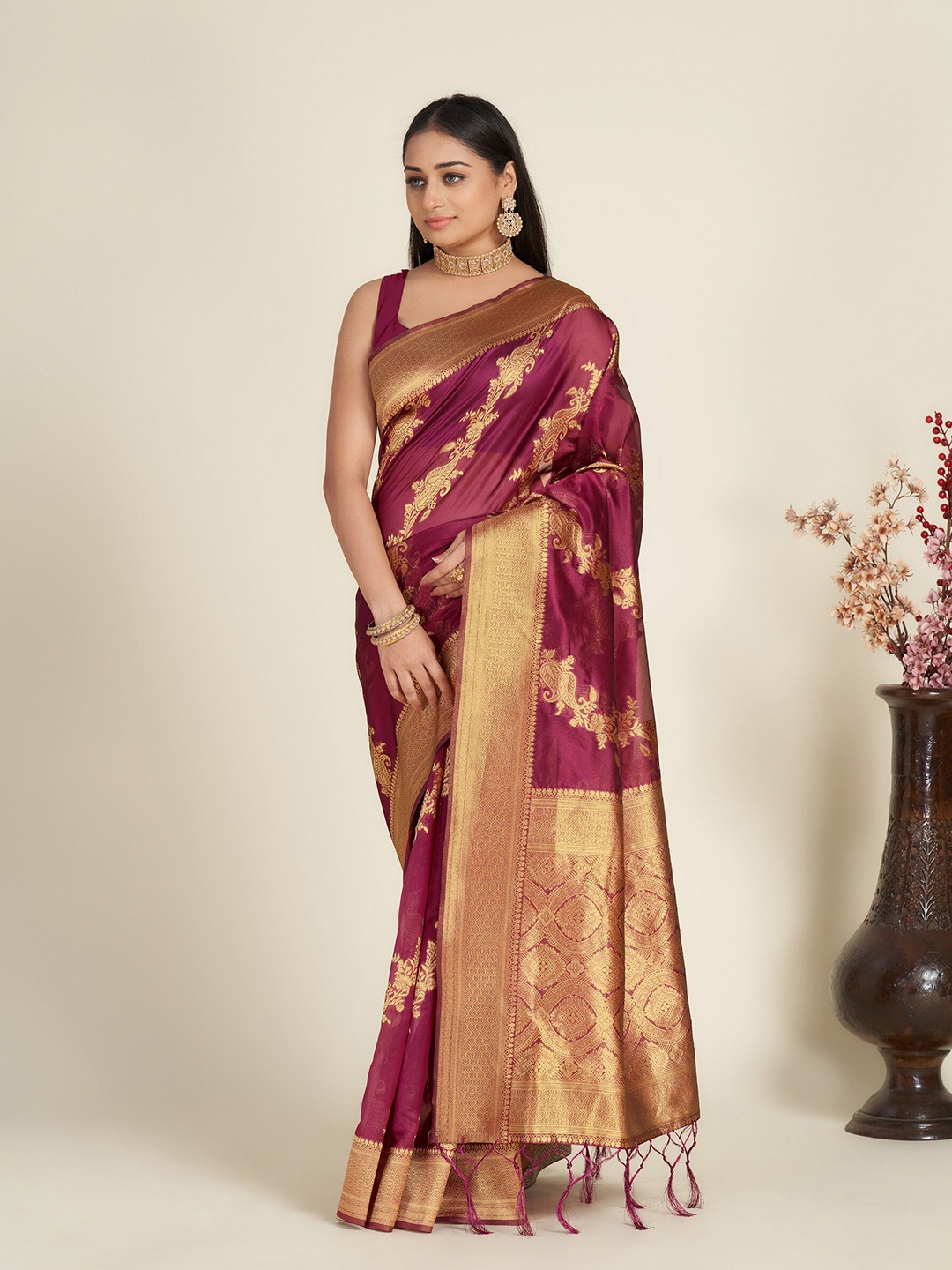 

Anouk Magenta & Gold-Toned Ethnic Motif Woven Design Zari Organza Saree