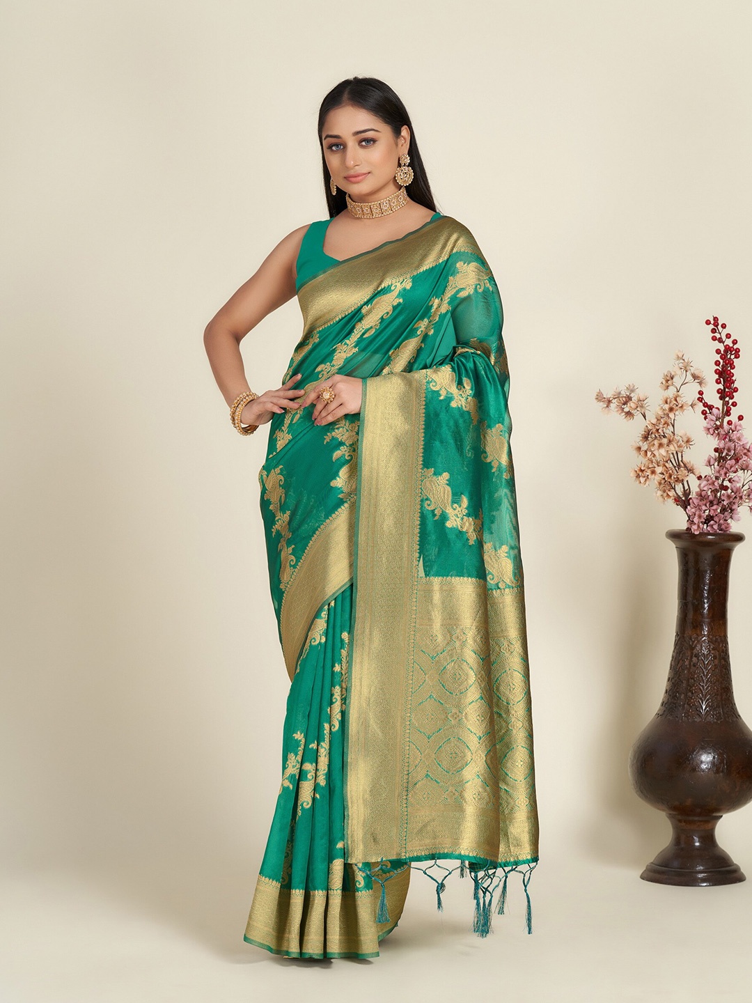 

Anouk Teal & Gold-Toned Ethnic Motif Woven Design Zari Organza Saree, Green