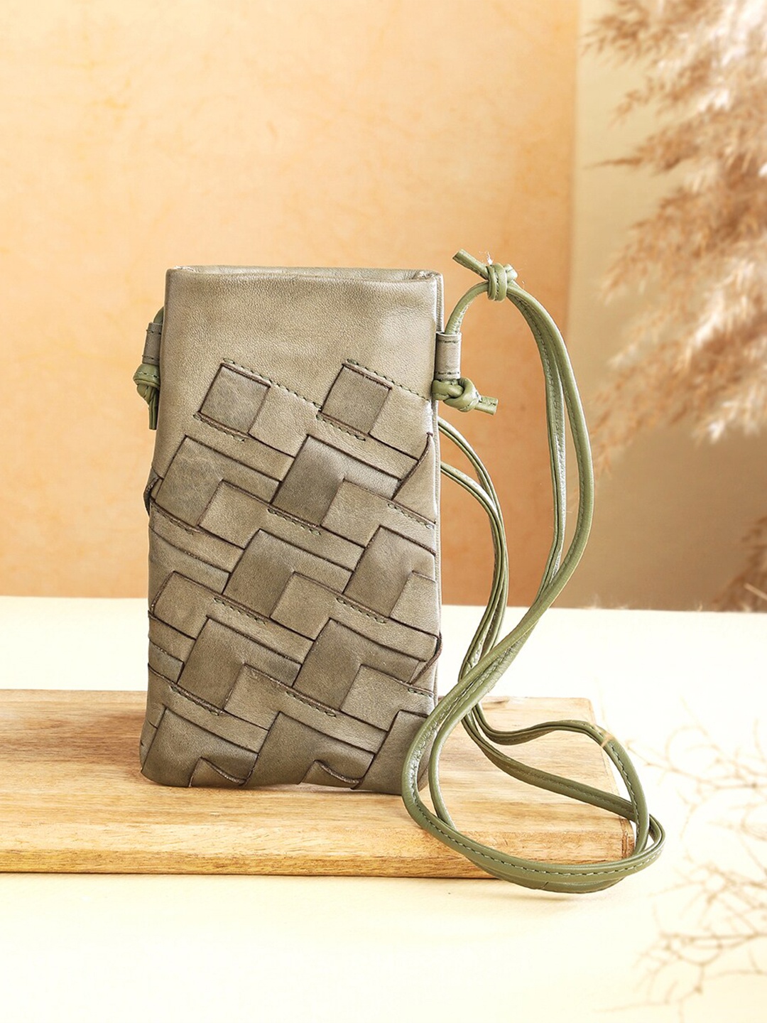 

Fabindia Miniature Textured Leather Mobile Sling Bag, Green