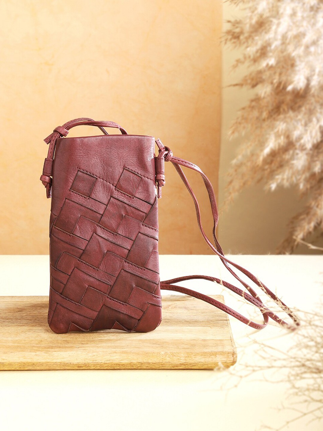 

Fabindia Textured Leather Mobile Pouch, Maroon