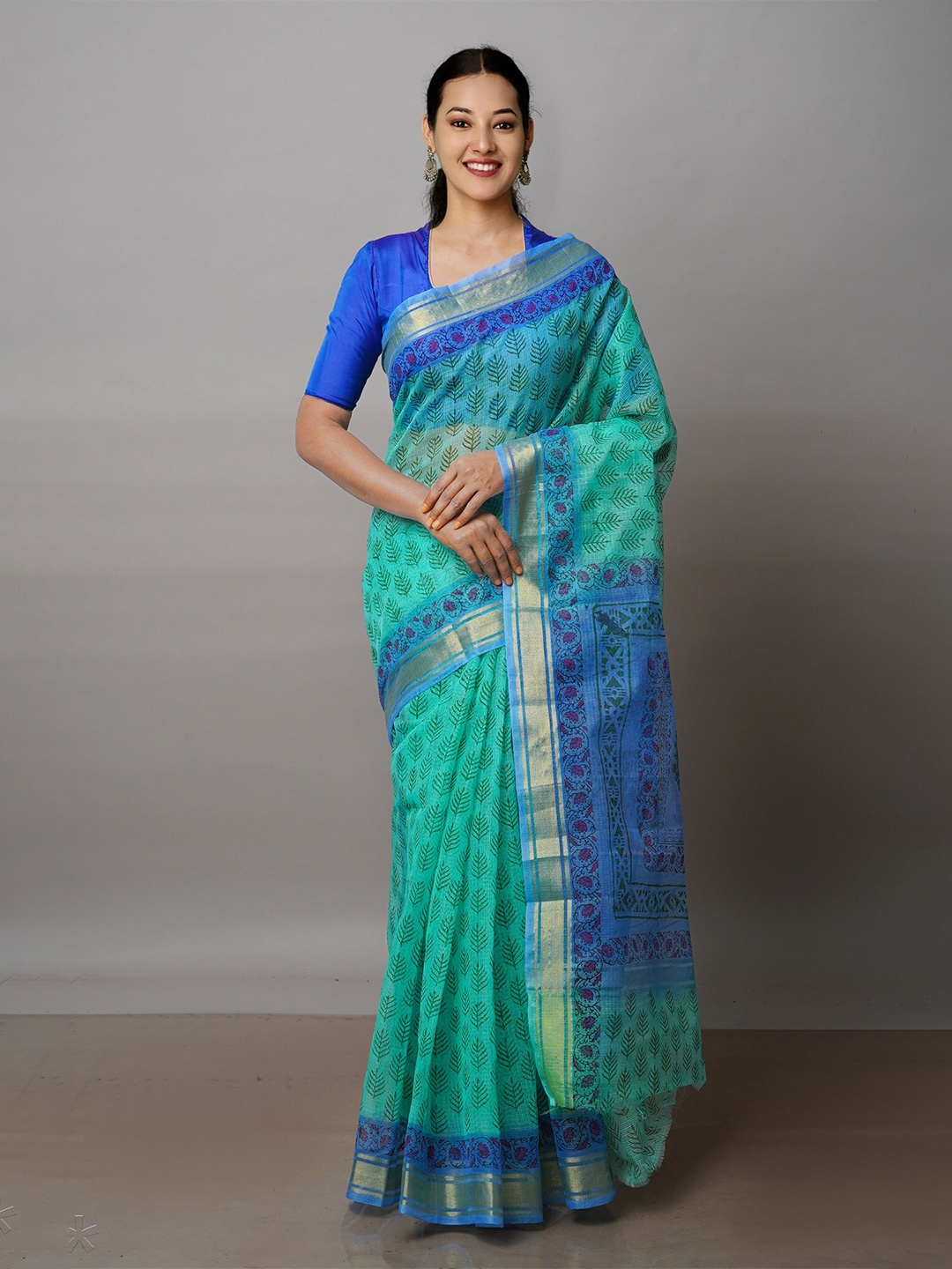 

Unnati Silks Green & Blue Ethnic Motifs Zari Pure Cotton Kota Saree