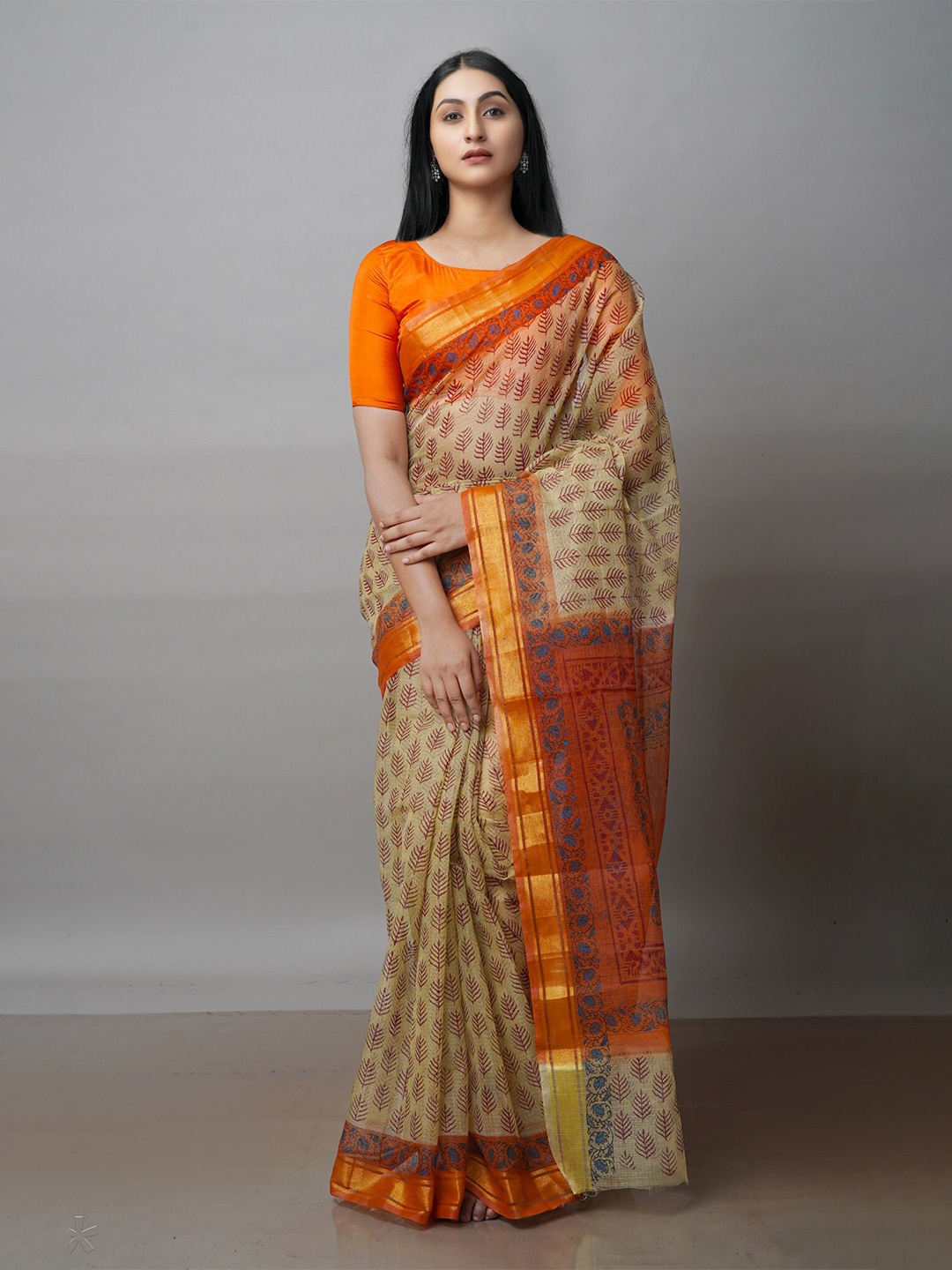 

Unnati Silks Beige & Orange Ethnic Motifs Zari Pure Cotton Kota Saree