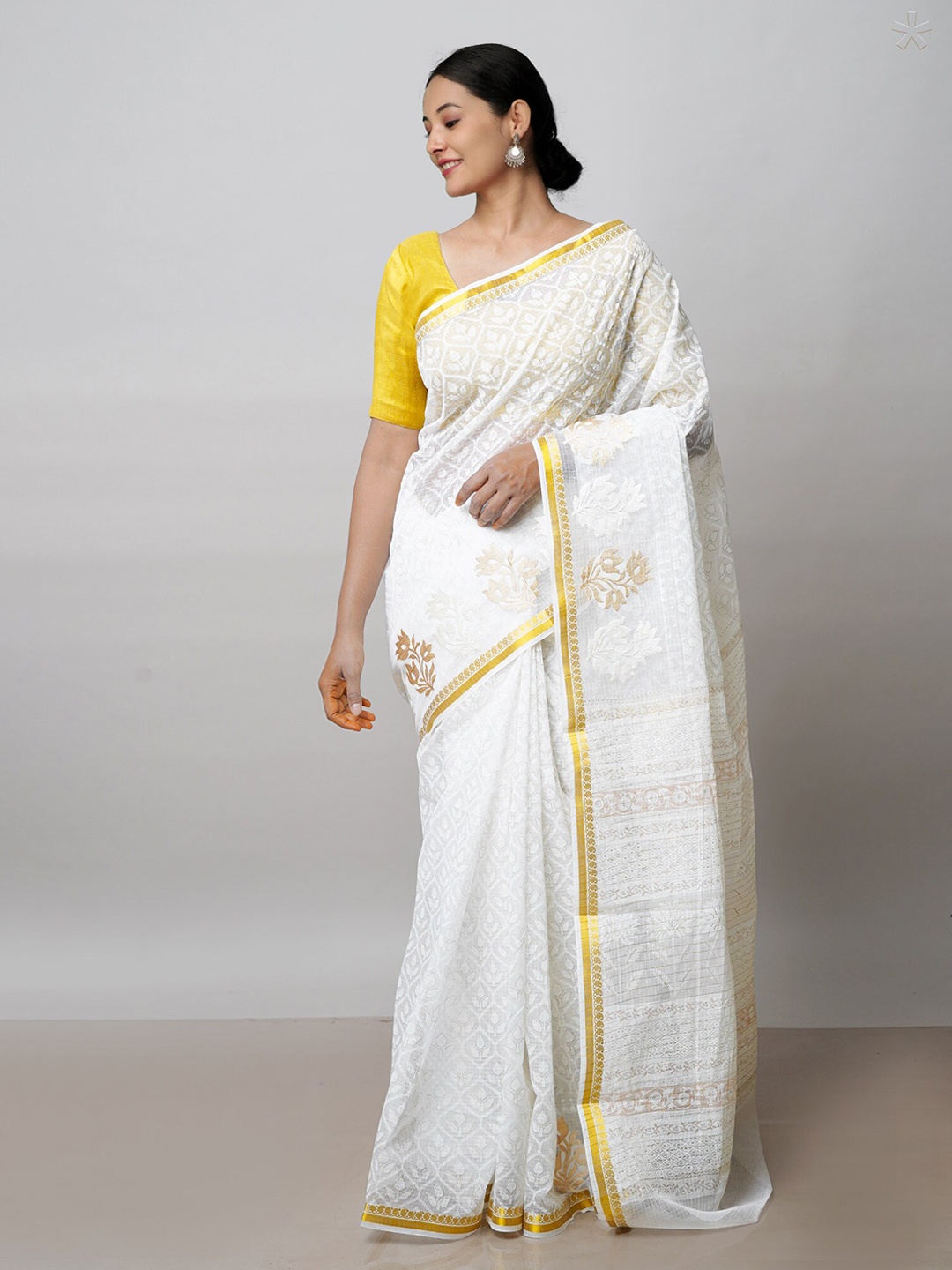 

Unnati Silks Off White & Gold-Toned Ethnic Motifs Zari Silk Cotton Kota Saree