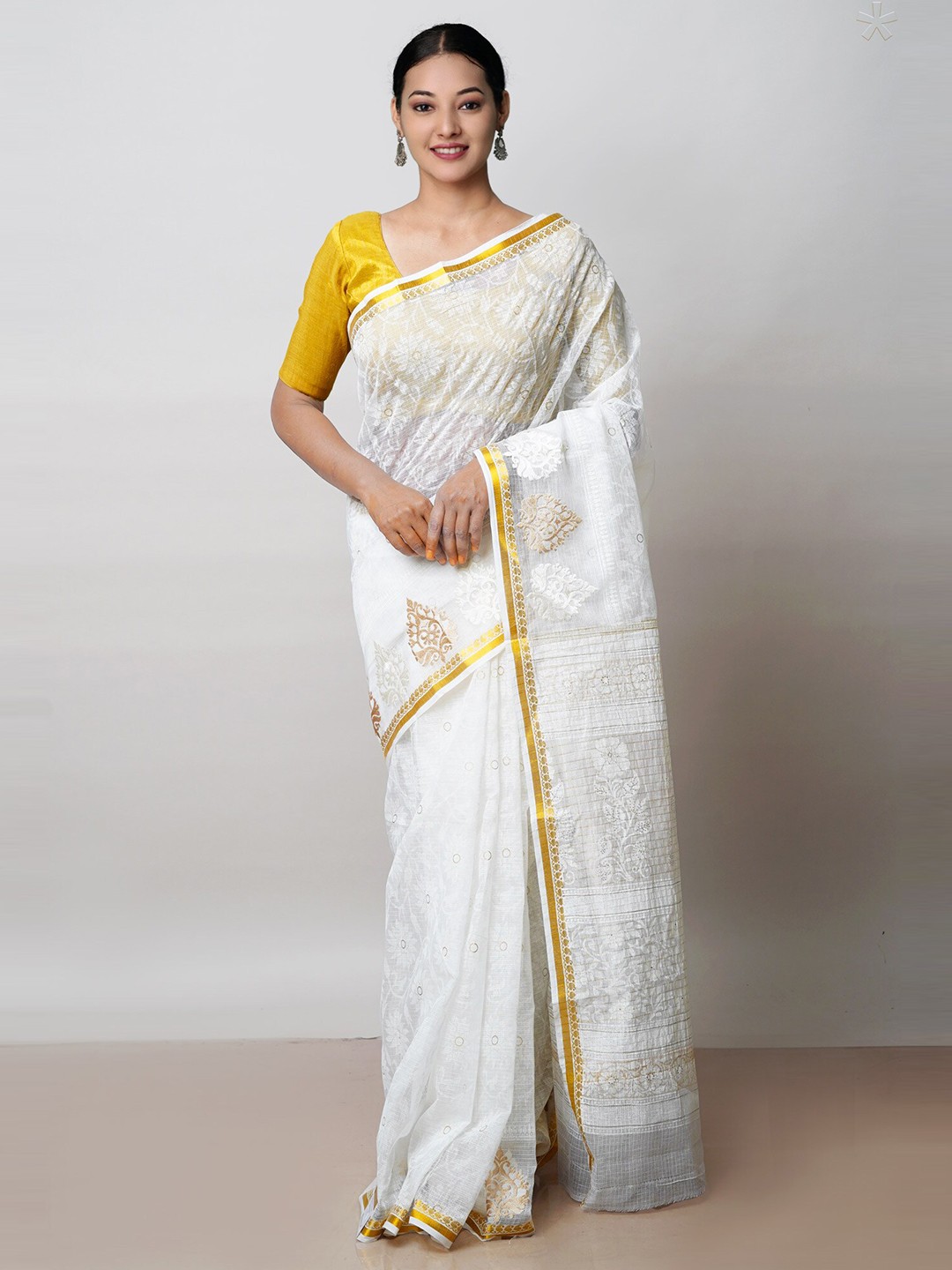 

Unnati Silks Off White & Gold-Toned Ethnic Motifs Zari Silk Cotton Kota Saree