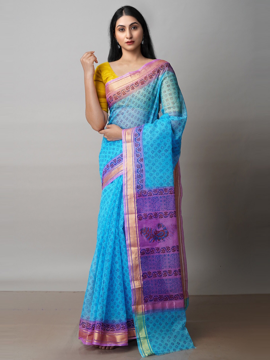

Unnati Silks Blue & Purple Ethnic Motifs Zari Pure Cotton Kota Saree