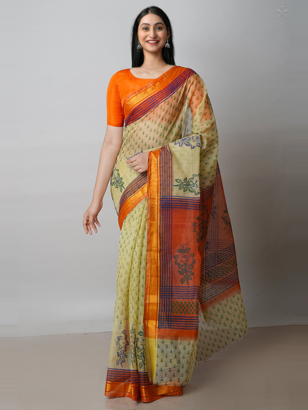 

Unnati Silks Beige & Orange Ethnic Motifs Zari Pure Cotton Kota Saree