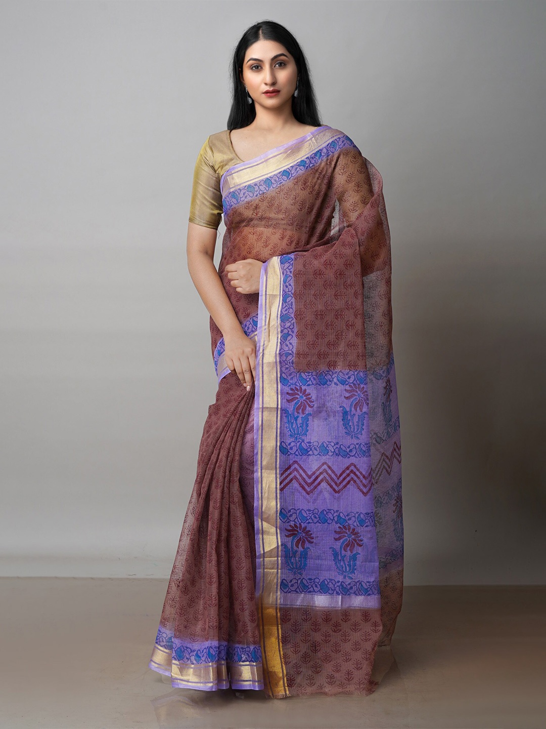 

Unnati Silks Burgundy & Purple Ethnic Motifs Zari Pure Cotton Kota Saree