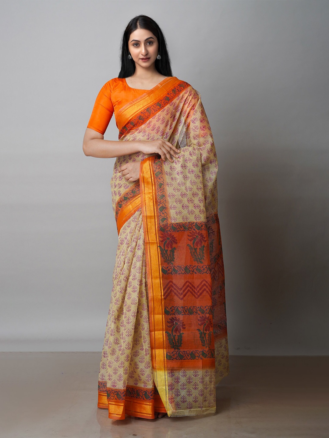 

Unnati Silks Beige & Orange Ethnic Motifs Zari Pure Cotton Kota Saree