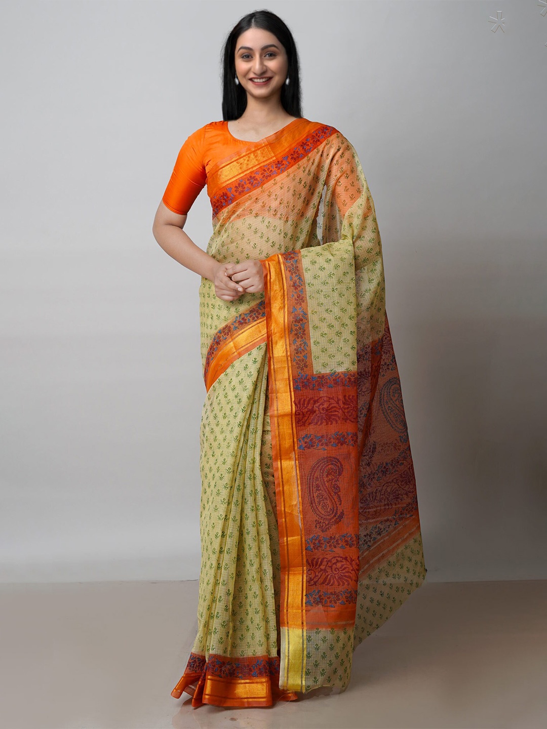 

Unnati Silks Beige & Orange Ethnic Motifs Zari Pure Cotton Kota Saree