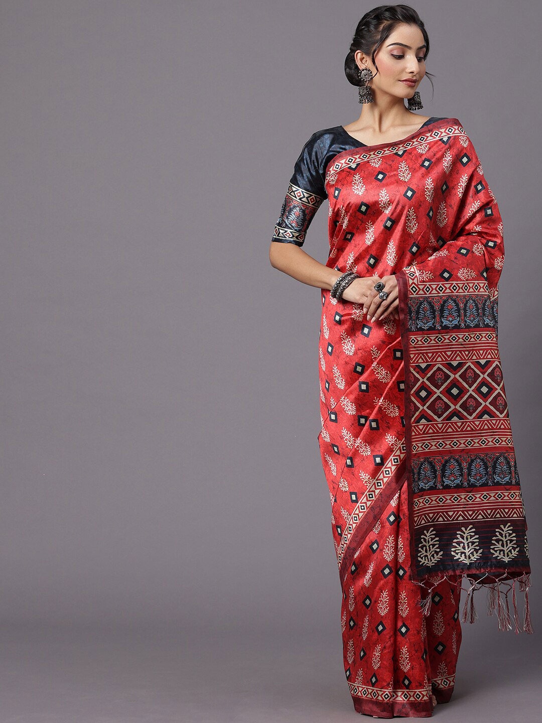 

Mitera Maroon & White Ethnic Motifs Printed Saree