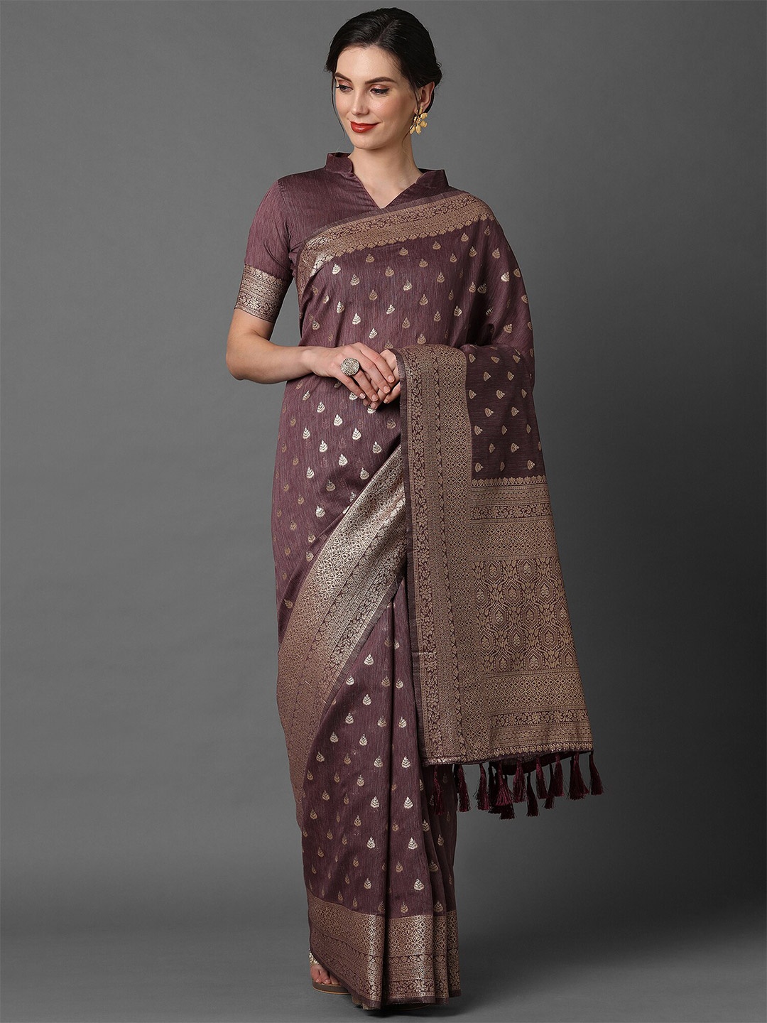 

Mitera Mauve & Gold Ethnic Motif Zari Silk Blend Banarasi Saree With Tassle