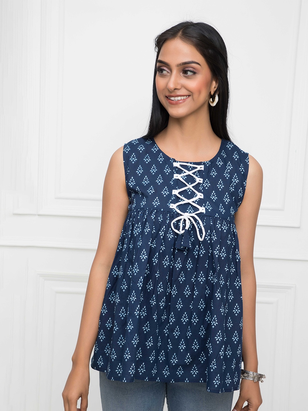 

Myshka Ethnic Printed Sleeveless Pure Cotton Empire Top With Tie-Up Detail, Blue