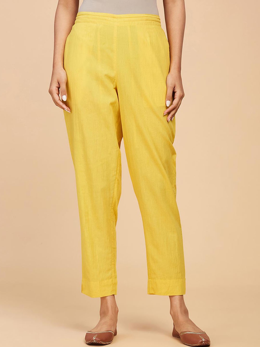 

Fabindia Women Mid Rise Plain Knitted Cotton Cropped Trousers, Yellow