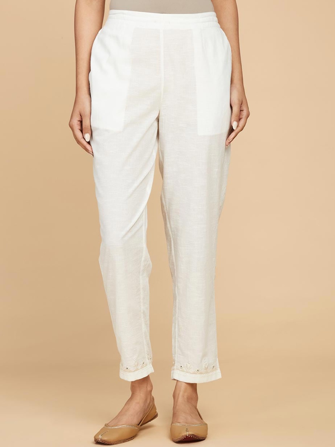 

Fabindia Women Mid Rise Plain Knitted Cotton Cropped Trousers, Off white
