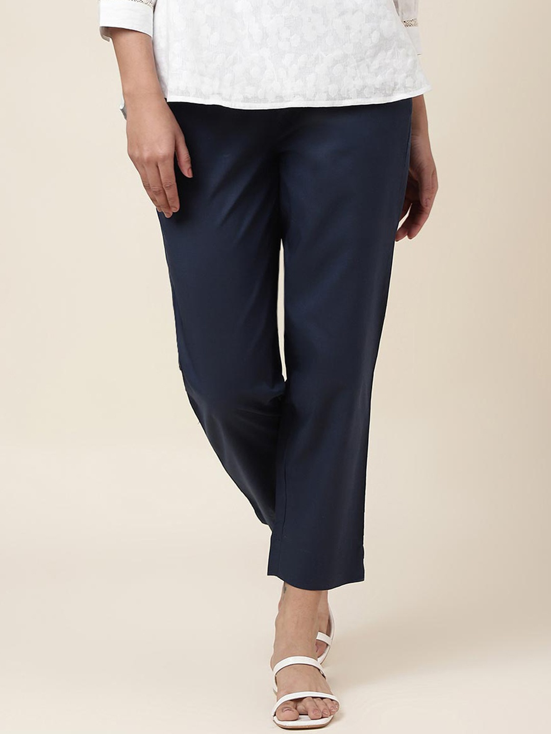 

Fabindia Women Mid Rise Plain Knitted Cotton Cropped Trousers, Navy blue