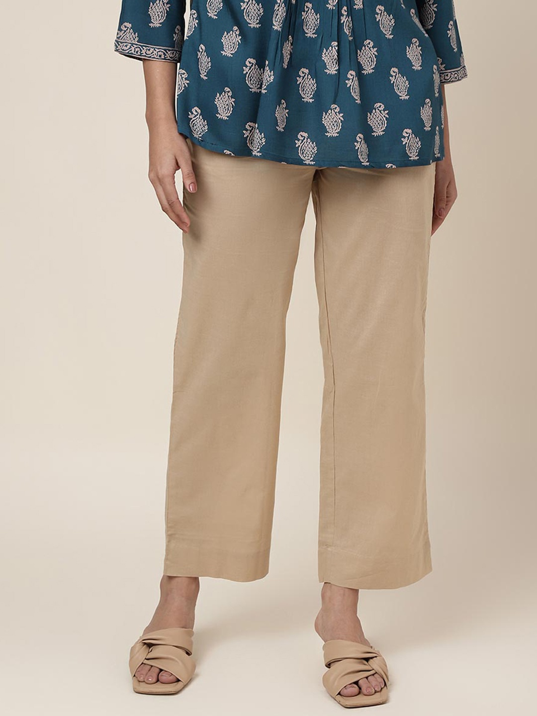 

Fabindia Women Mid Rise Plain Knitted Cropped Cotton Trousers, Beige
