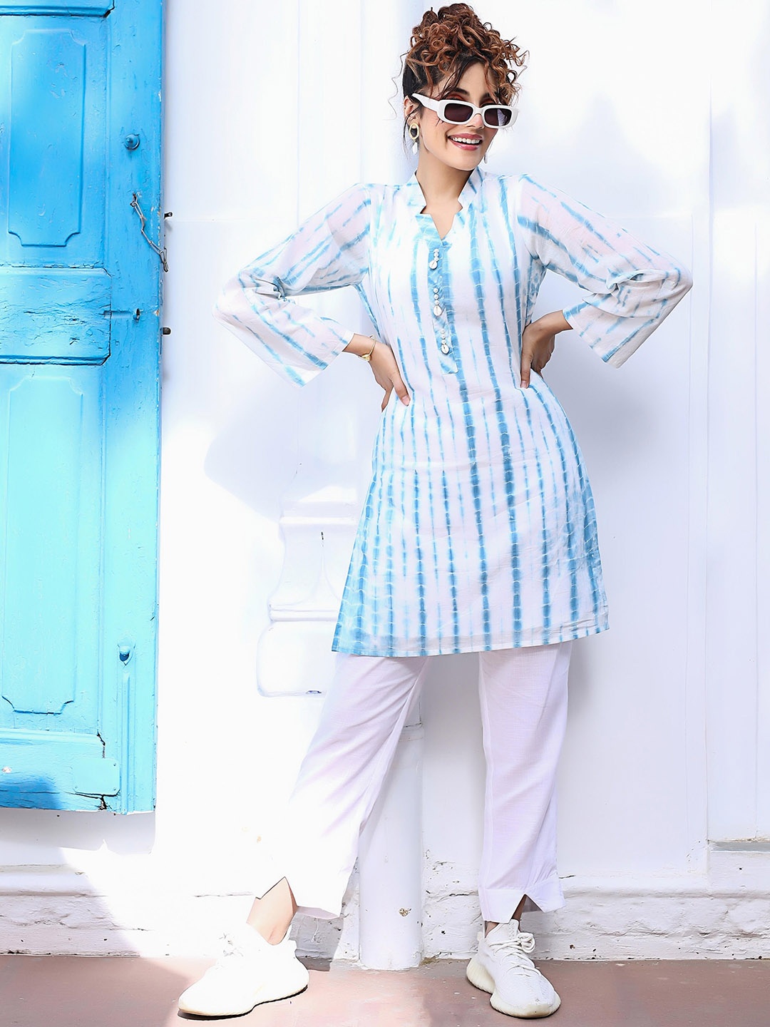 

Thread & Button Striped Printed Beads and Stones Kurta with Palazzos, Blue