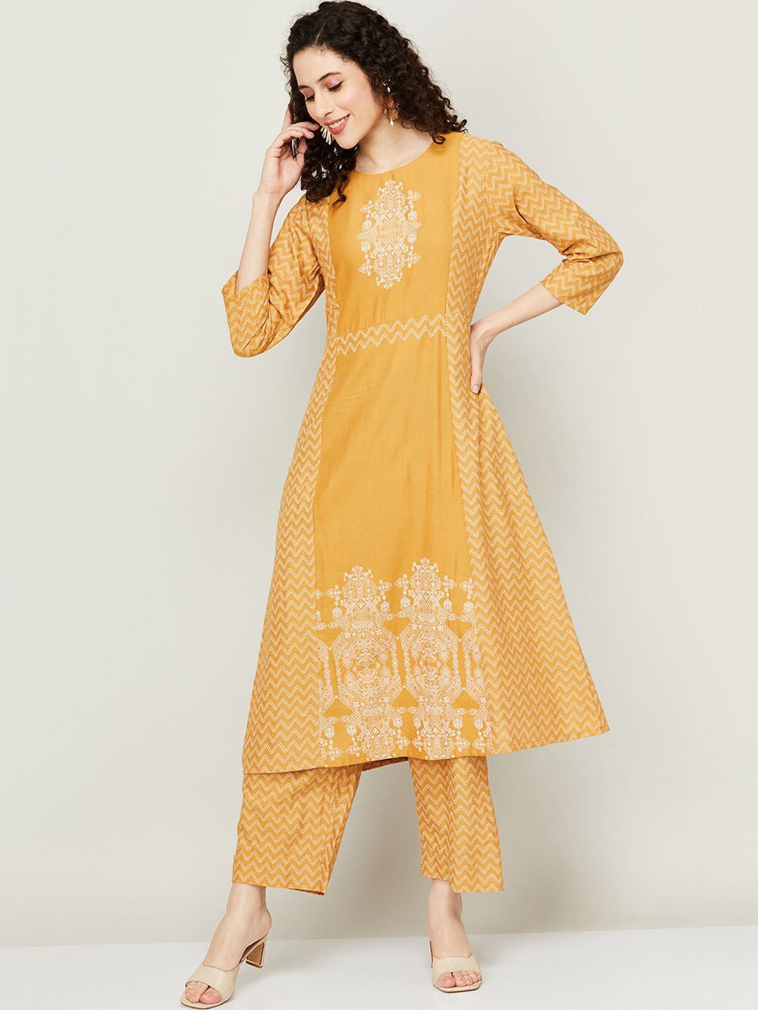

Melange by Lifestyle Chevron Printed Thread Work Kurta With Palazzos, Mustard