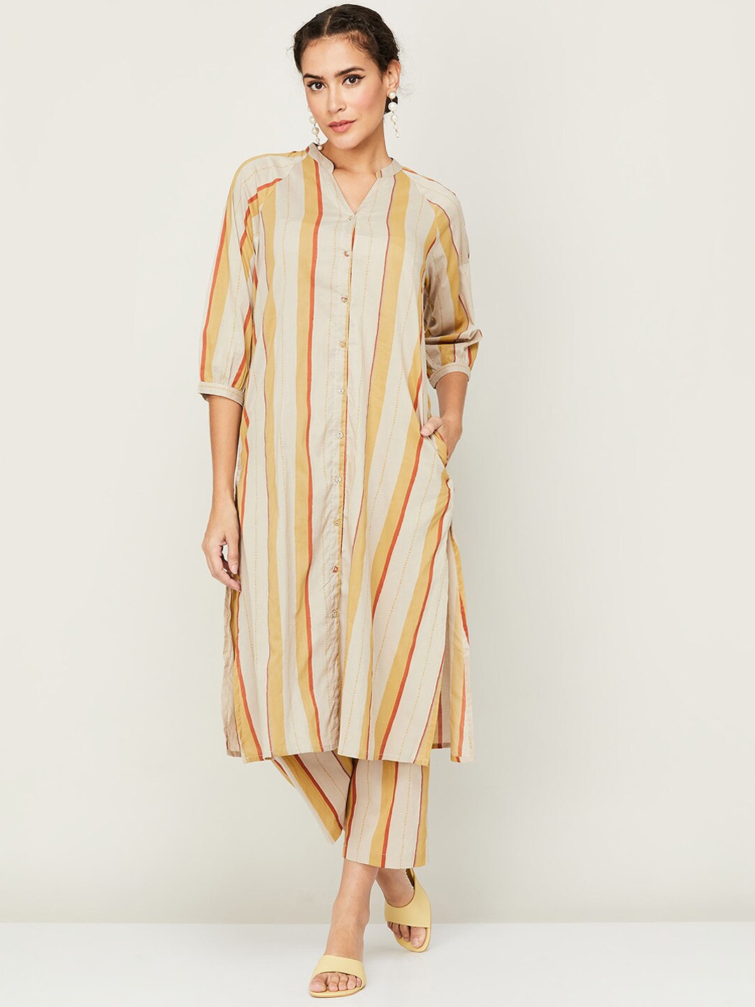 

Melange by Lifestyle Striped Pure Cotton Kurta With Trouser, Mustard
