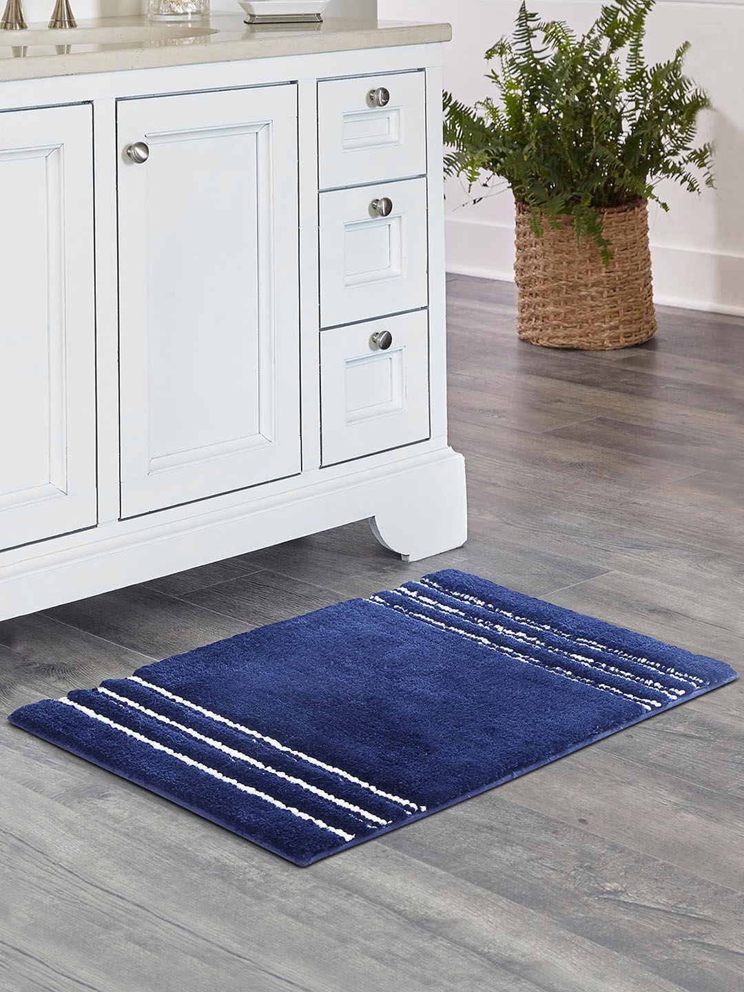 

OBSESSIONS Navy Blue & White Self Design Ultra Absorbent Anti-Skid Rectangular Bathmat