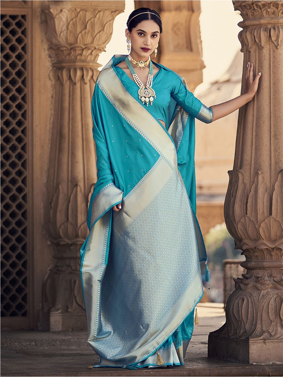 

Mitera Turquoise Blue & Gold Ethnic Motif Zari Silk Blend Banarasi Saree