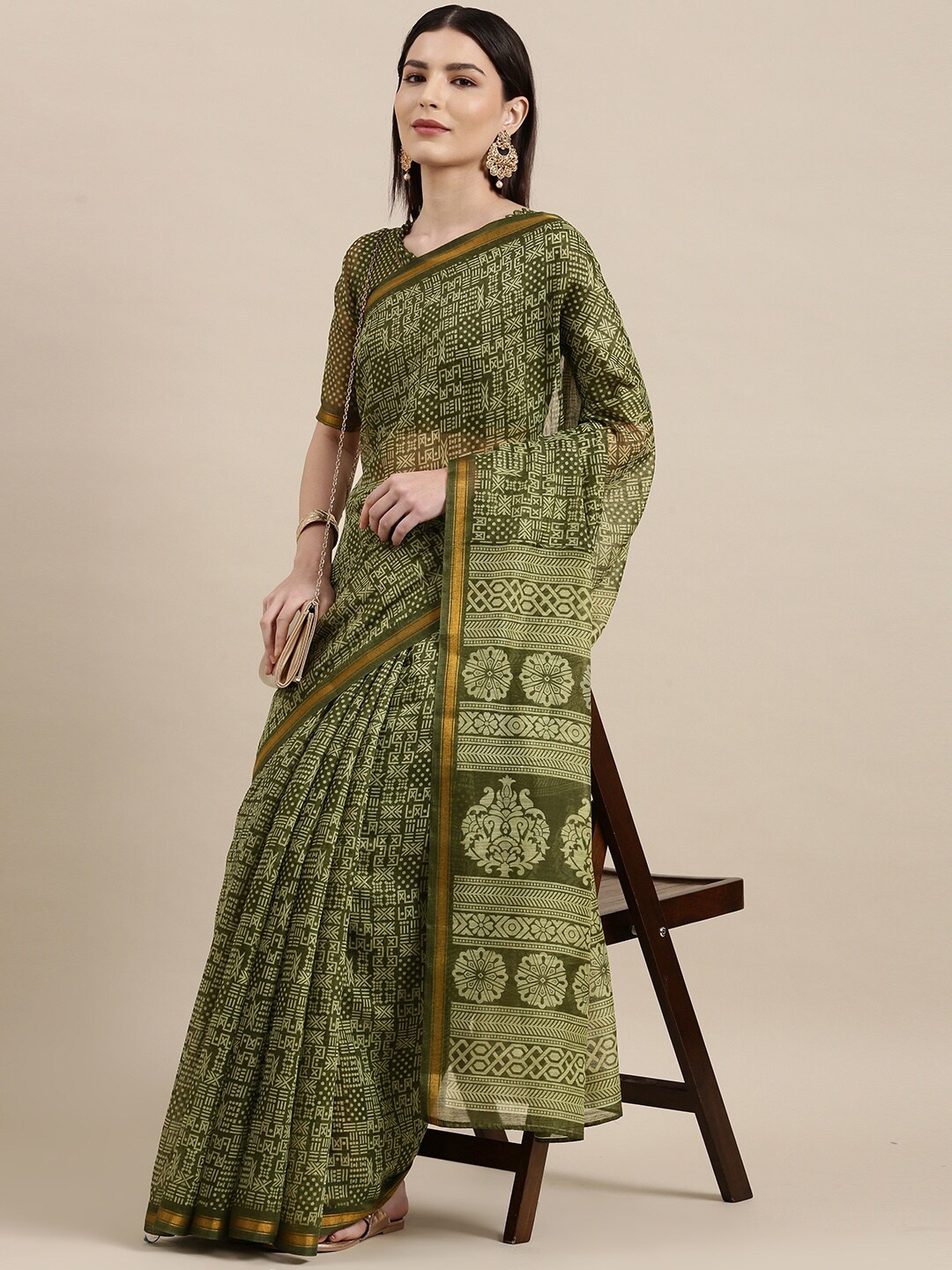 

Shaily Green & Gold-Toned Ethnic Motifs Zari Saree