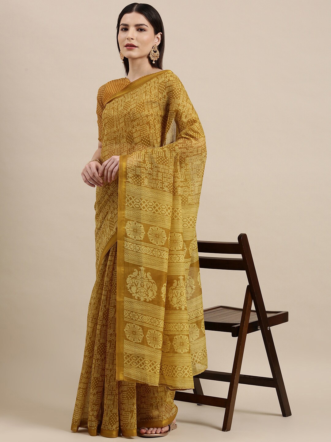 

Shaily Mustard & Gold-Toned Ethnic Motifs Zari Saree