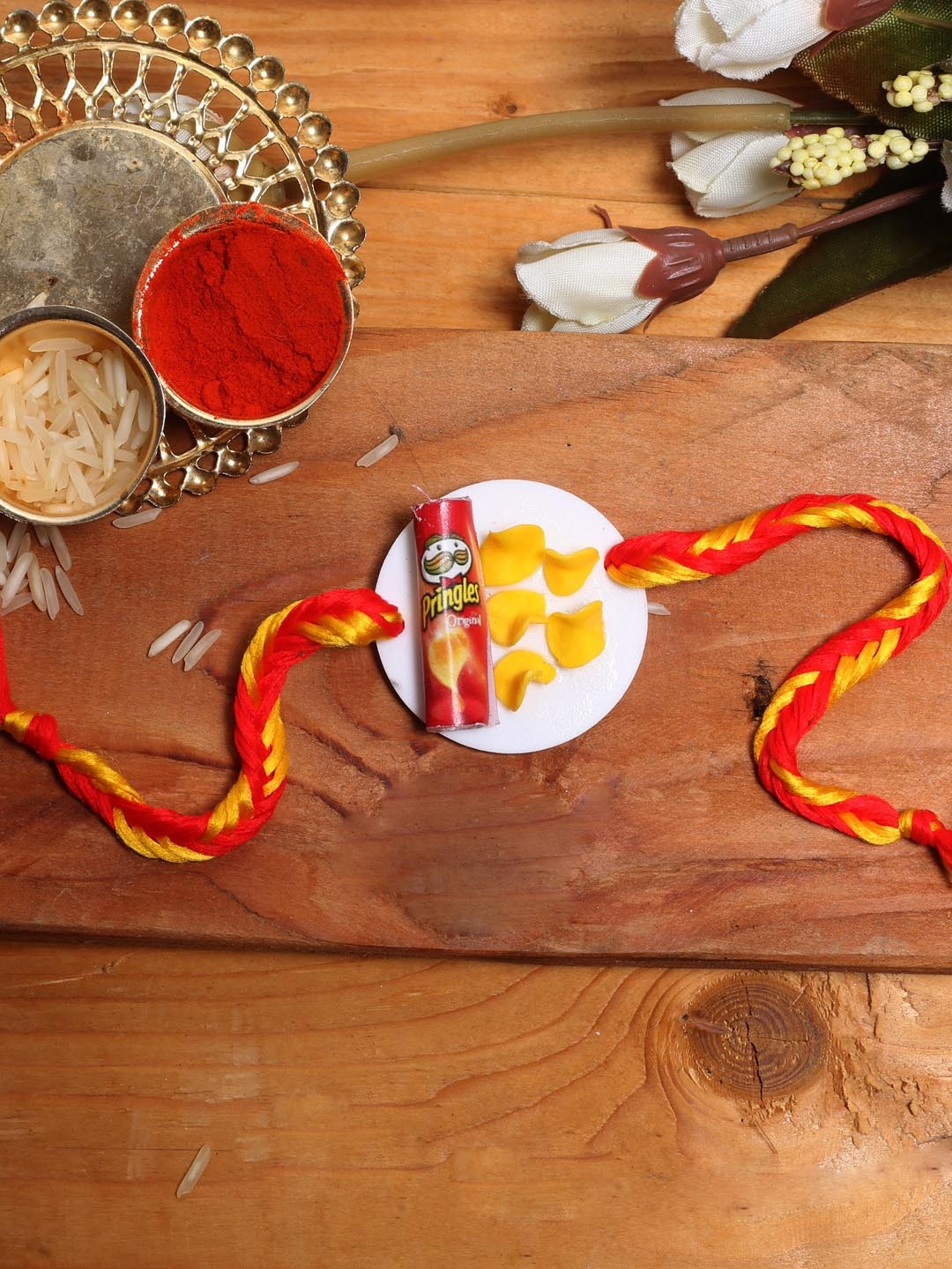 

Aapno Rajasthan Kids Pringle Chips Rakhi, Red