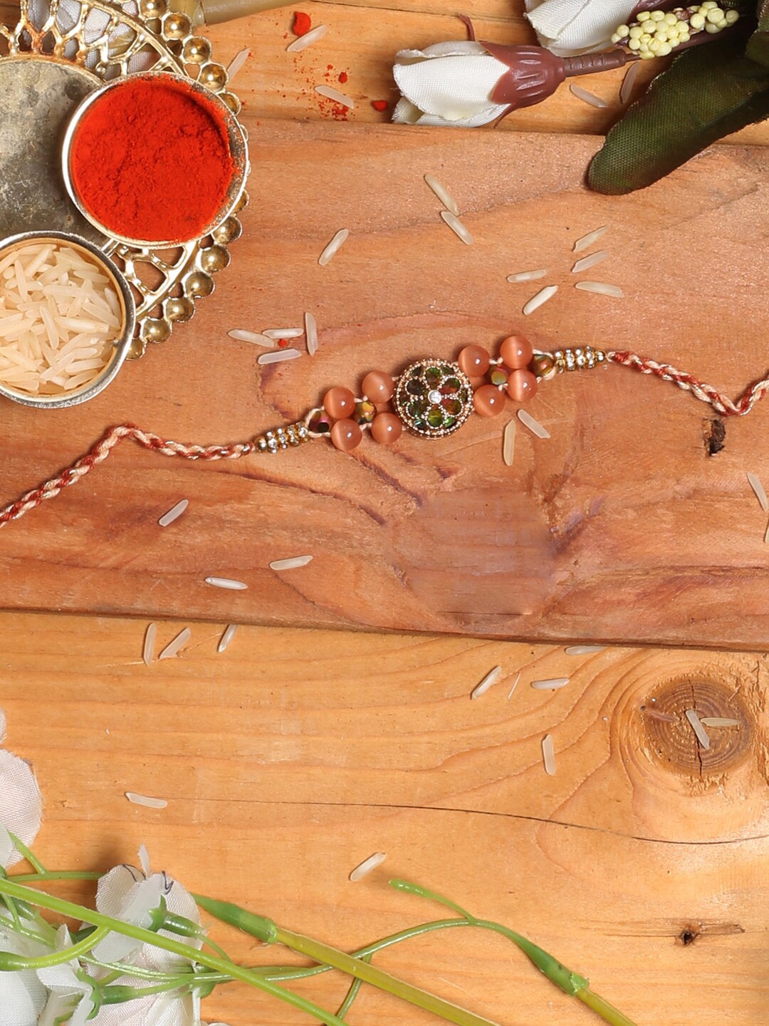

Aapno Rajasthan Floral Charm Rakhi, Brown