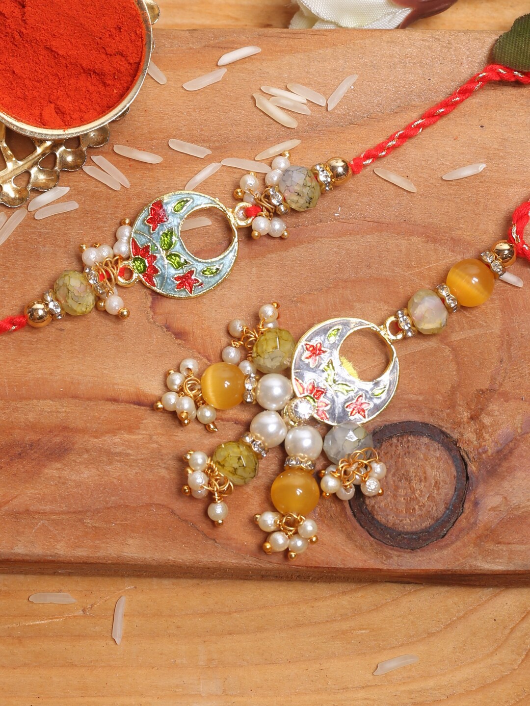 

Aapno Rajasthan Set Of 2 Floral Embellished Rakhi, Blue
