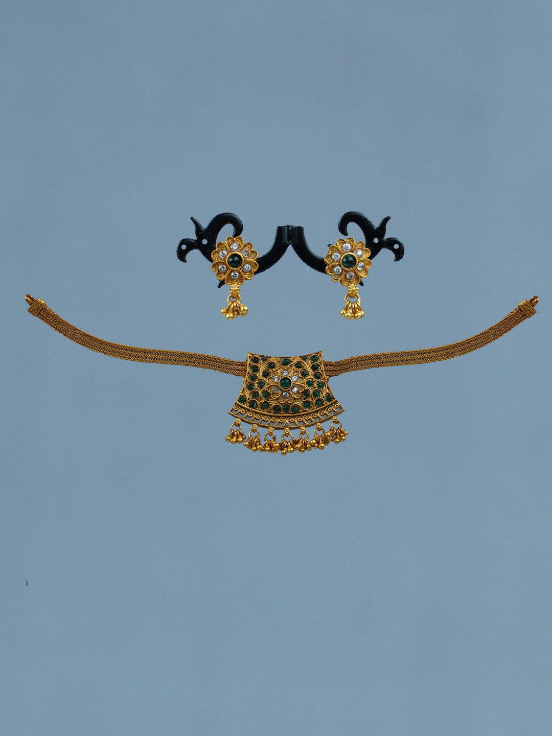 

Diksha collection Gold-Plated Stone-Studded Jewellery Set