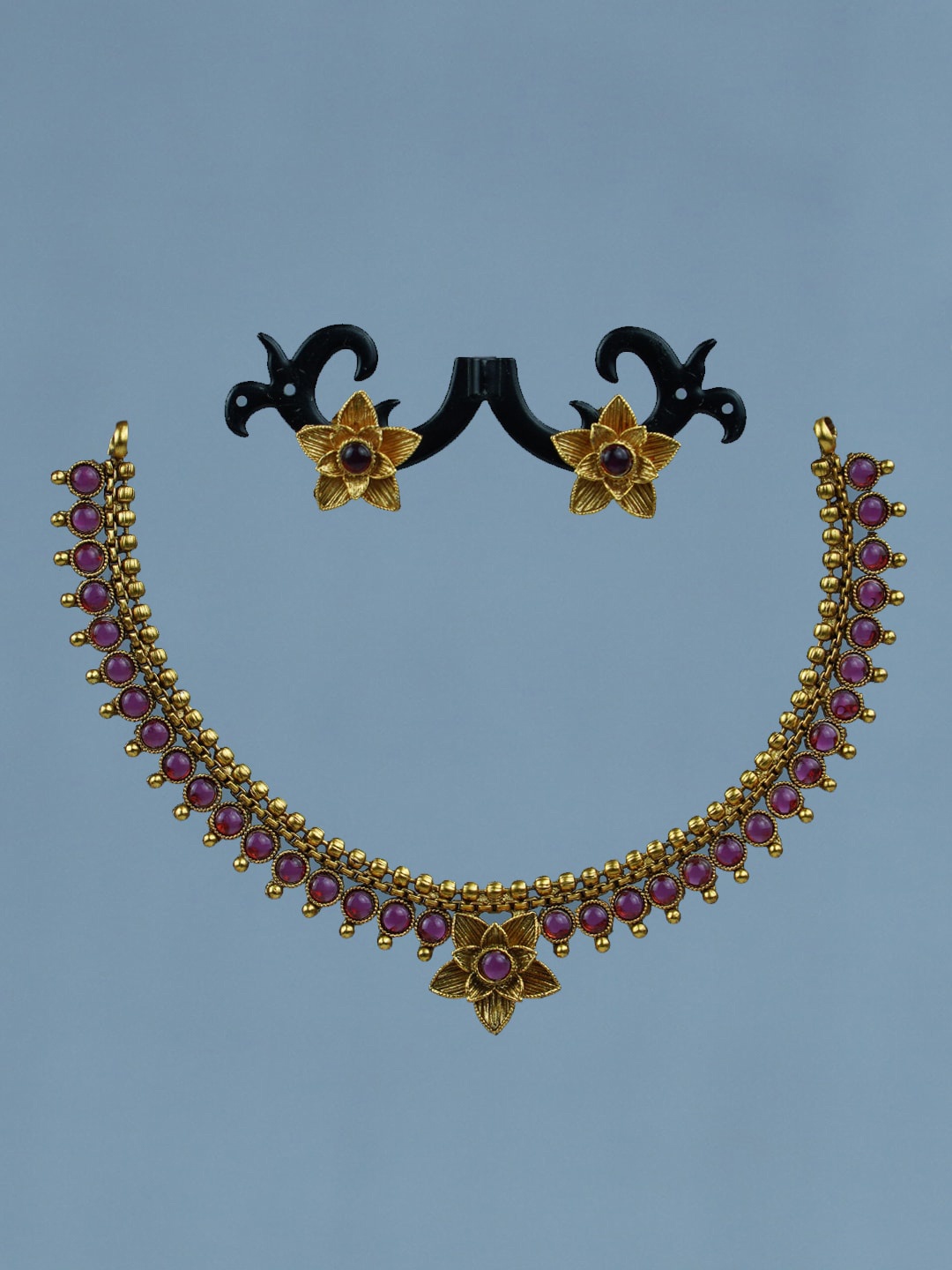 

Diksha collection Gold-Plated Stone-Studded Jewellery Set