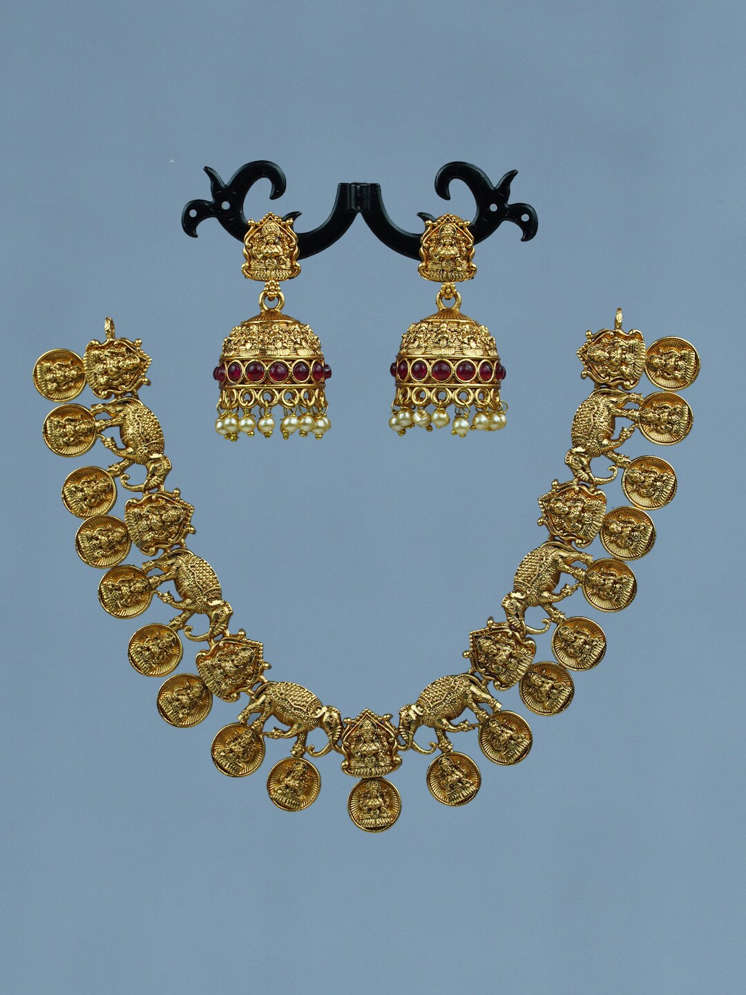 

Diksha collection Gold-Plated Stone-Studded & Pearl Beaded Jewellery Set